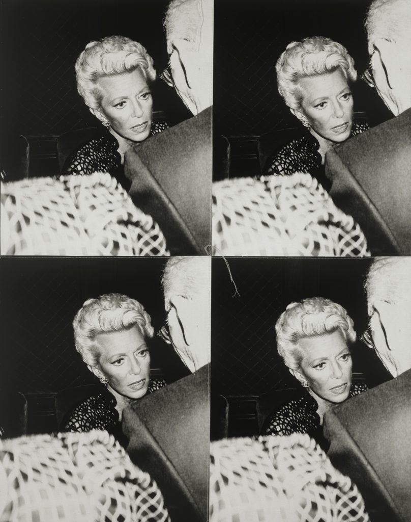 Photograph of women repeated in four panels