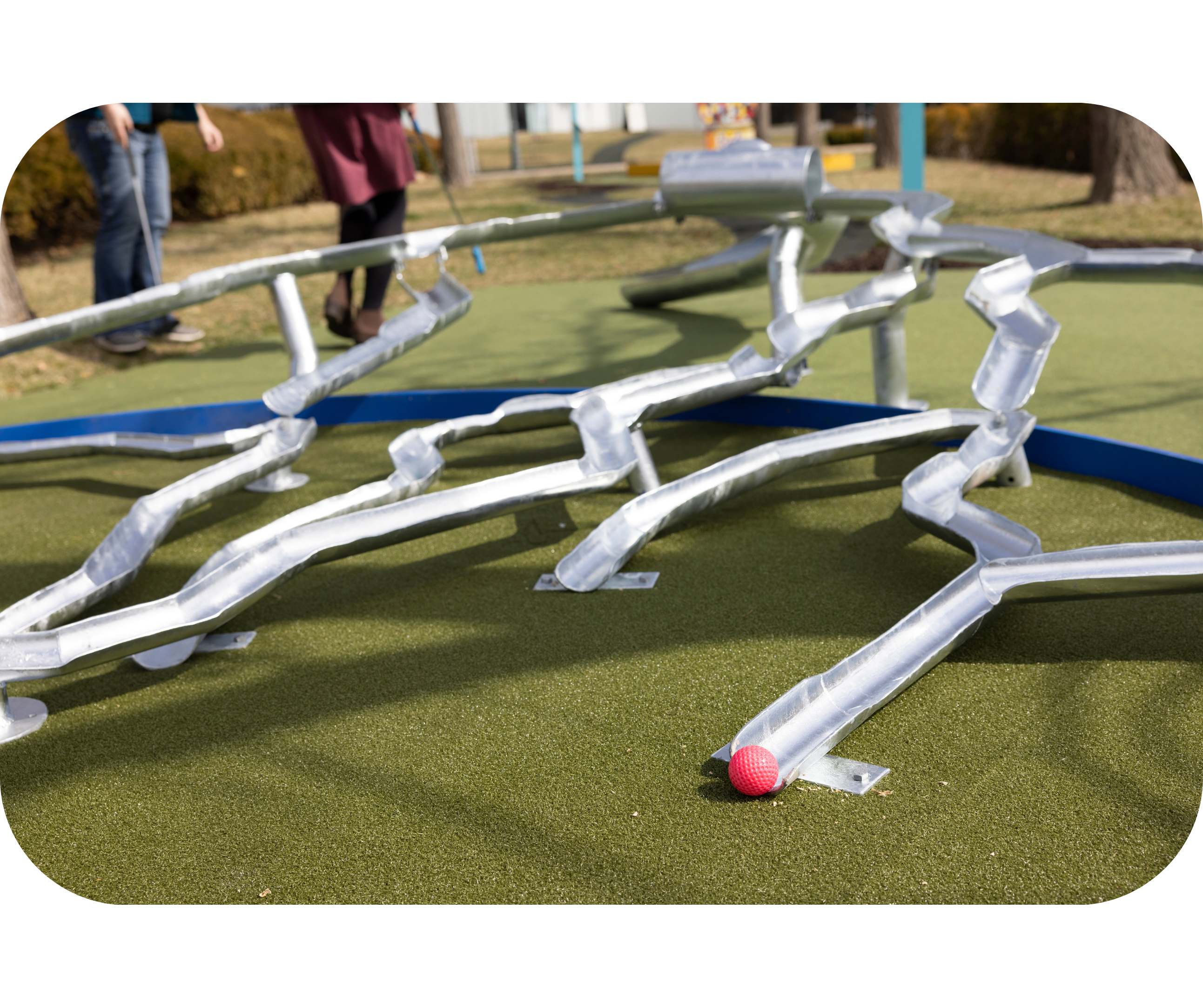 A mini-golf hole on the Nelson-Atkins Art Course inspired by Roxy Paine's Ferment sculpture/