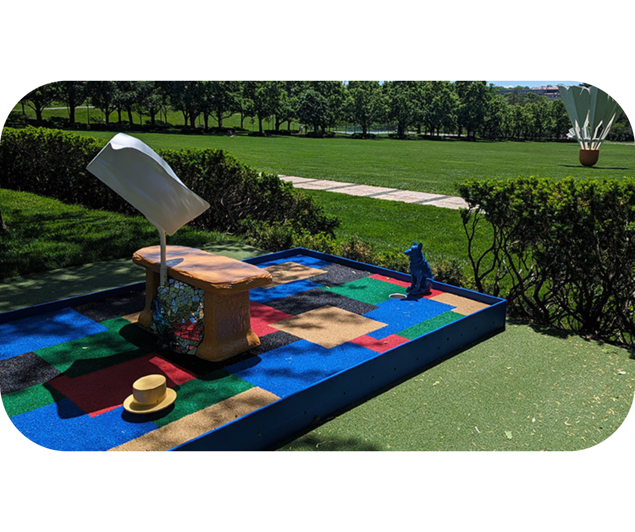 A mini-golf hole on the Nelson-Atkins Art Course inspired by Niki de Saint Phalle's sculpture Le Banc.