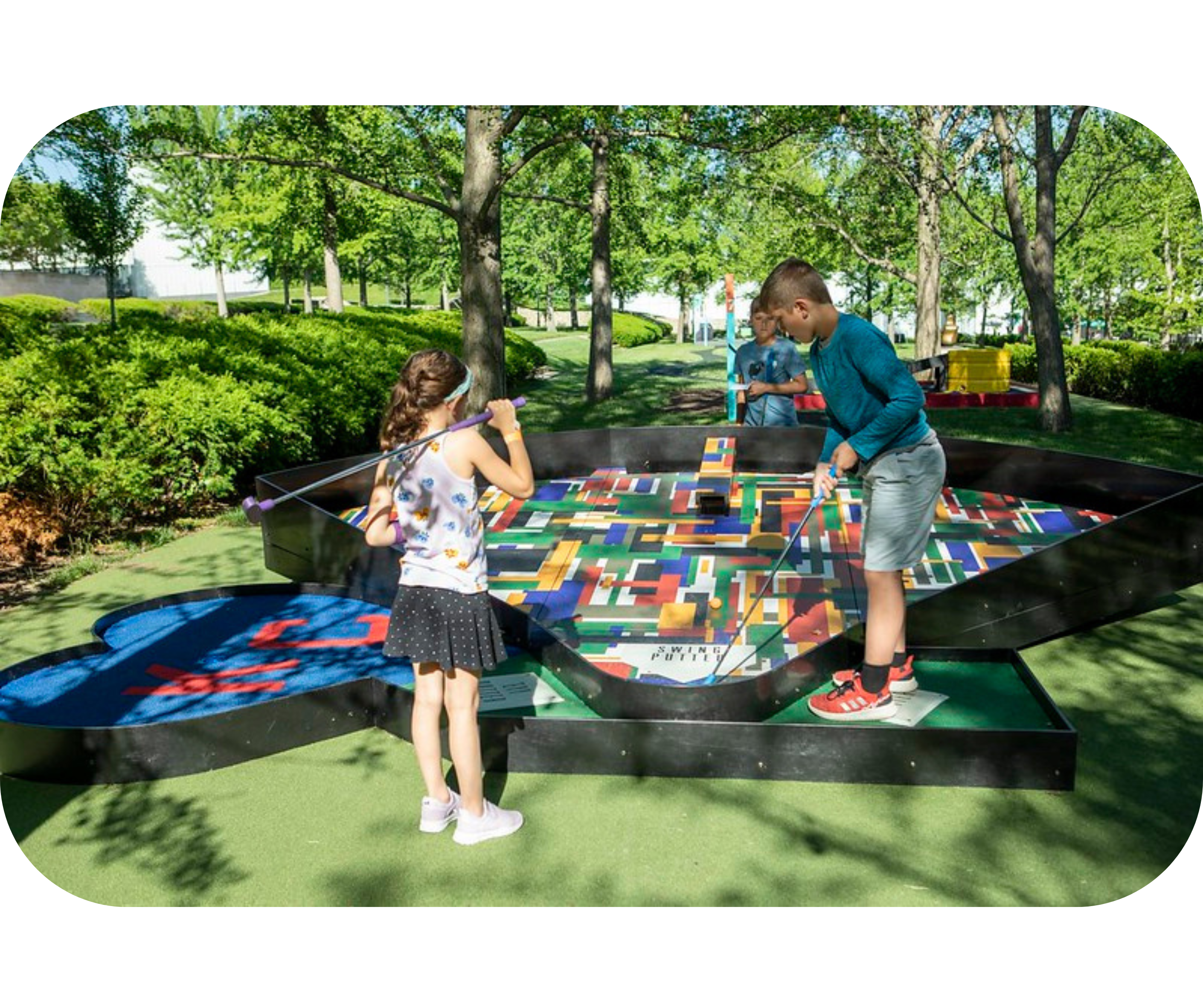 A mini-golf hole on the Nelson-Atkins Art Course inspired by Radcliffe Bailey's Mound Magician.