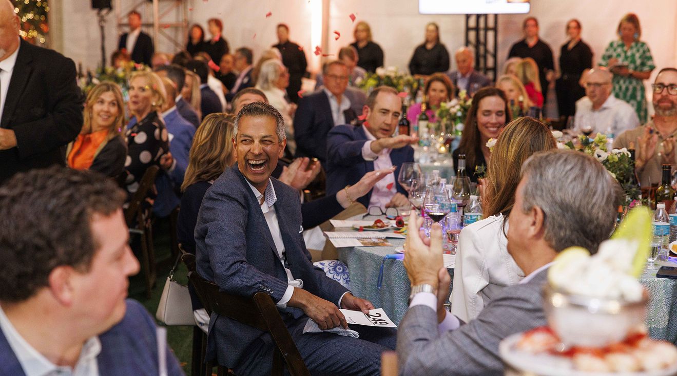 Museum supporters participating in the live auction at the Nelson-Atkins.