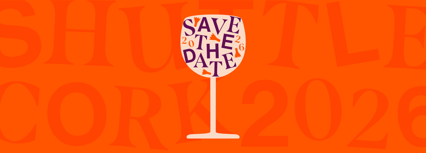 Orange image with cream wine class and text that says "Save the Date 2026 ShuttleCork"