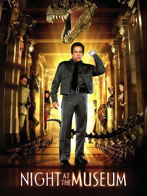 Blurry individuals walking through Bloch Lobby