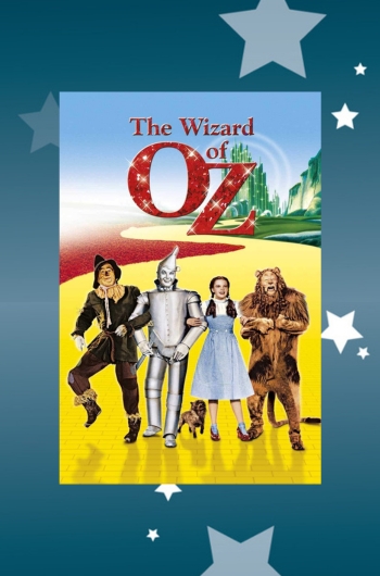 Blurry individuals walking through Bloch Lobby