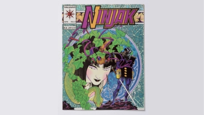 A person adjusting paintbrushes in their apron.