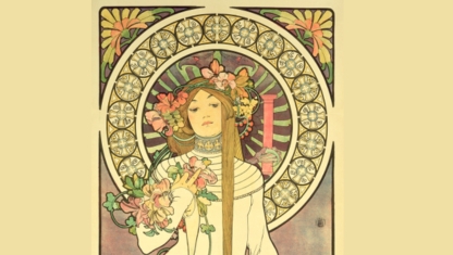 Multiple colors of pain on a table with pant brushes in them.