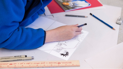 Multiple colors of pain on a table with pant brushes in them.